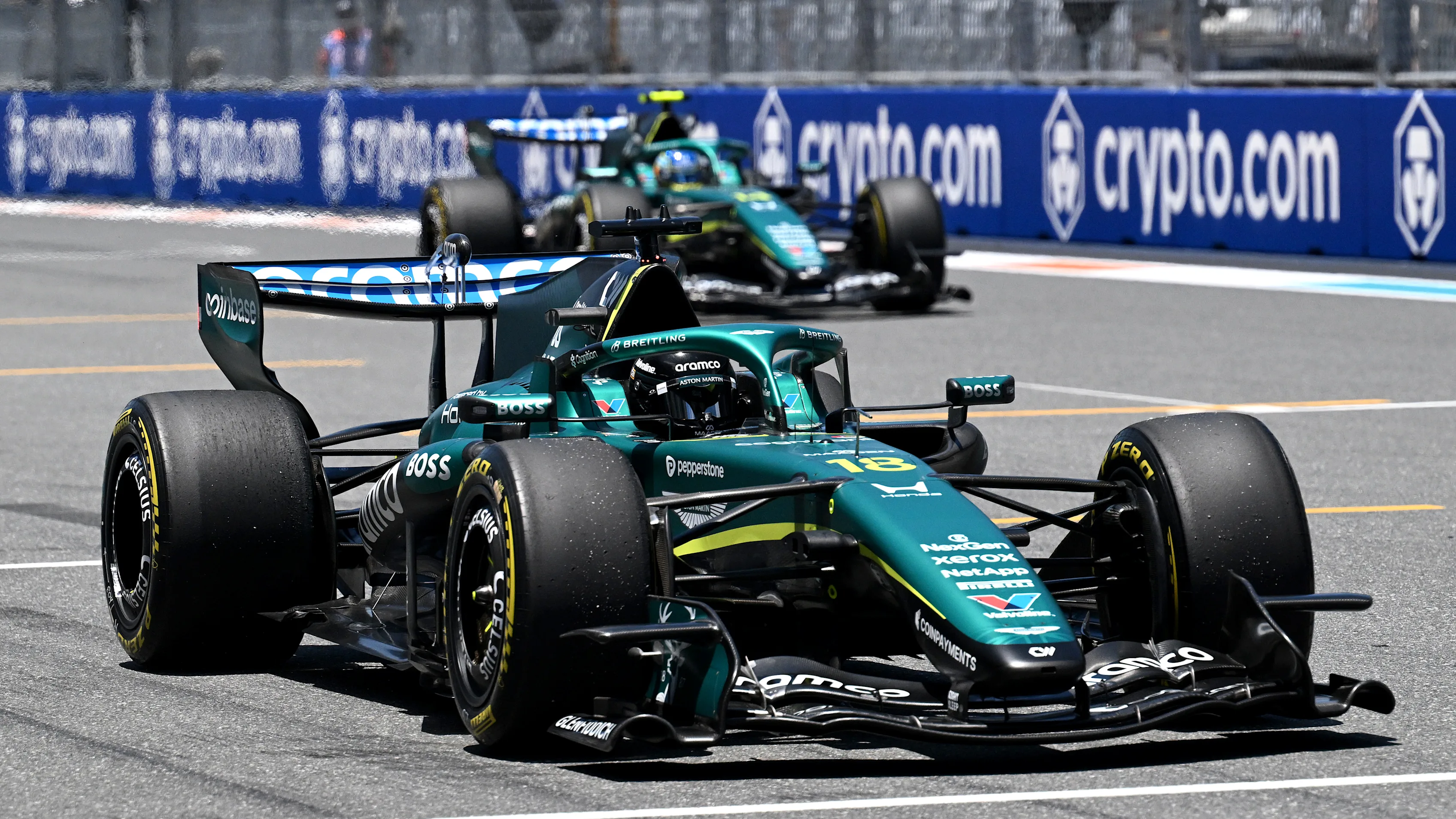 MIAMI, FLORIDA - MAY 01: Lance Stroll of Canada driving the (18) Aston Martin F1 Team AMR26 Honda and Fernando Alonso of Spain driving the (14) Aston Martin F1 Team AMR26 Honda on track during practice ahead of the F1 Grand Prix of Miami at Miami International Autodrome on May 01, 2026 in Miami, Florida. (Photo by Mark Sutton - Formula 1/Formula 1 via Getty Images)