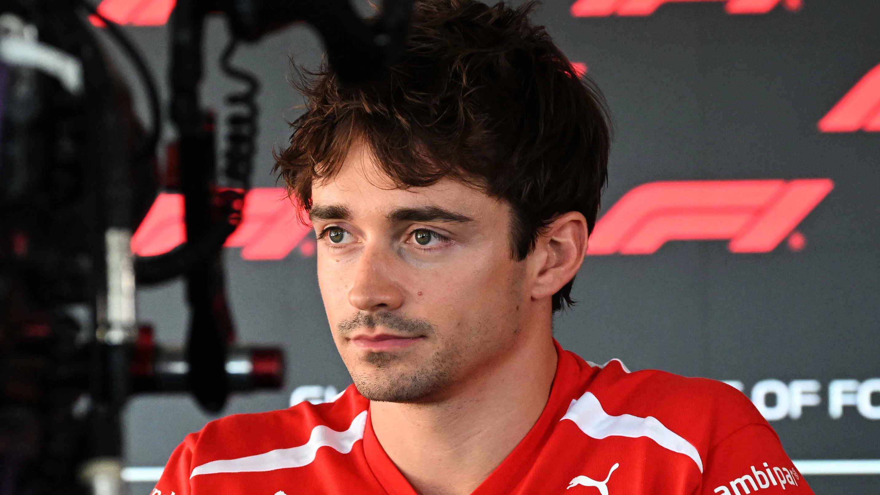 AUSTIN, TEXAS - OCTOBER 22: Charles Leclerc of Monaco and Scuderia Ferrari talks to the media