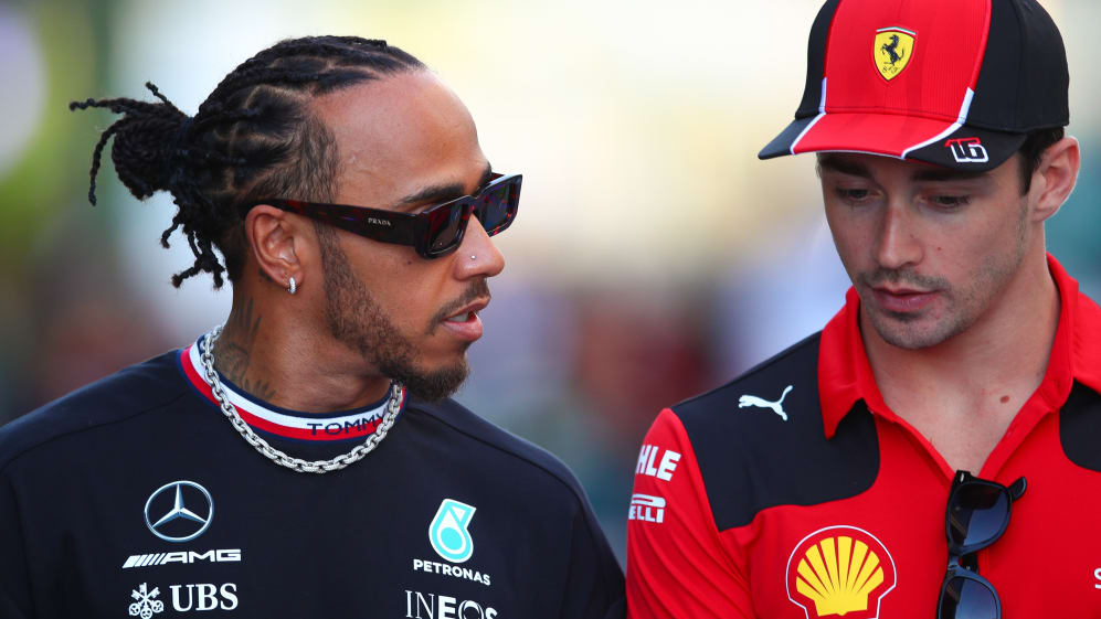 JEDDAH, SAUDI ARABIA - MARCH 16: Lewis Hamilton of Great Britain and Mercedes and Charles Leclerc