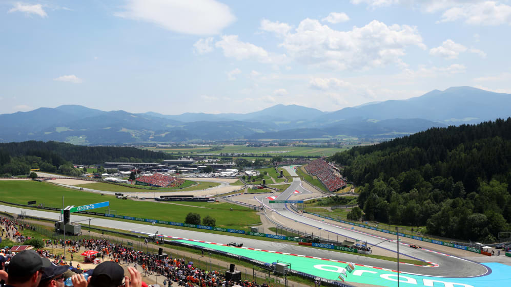SPIELBERG, AUSTRIA - JUNE 30: Fans watch drivers talk on the fan stage prior to practice ahead of