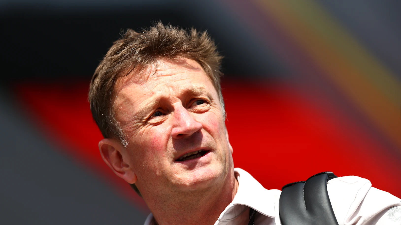 BARCELONA, SPAIN - JUNE 11: Allan McNish, Racing Director of Audi F1 Team arrives in the Paddock