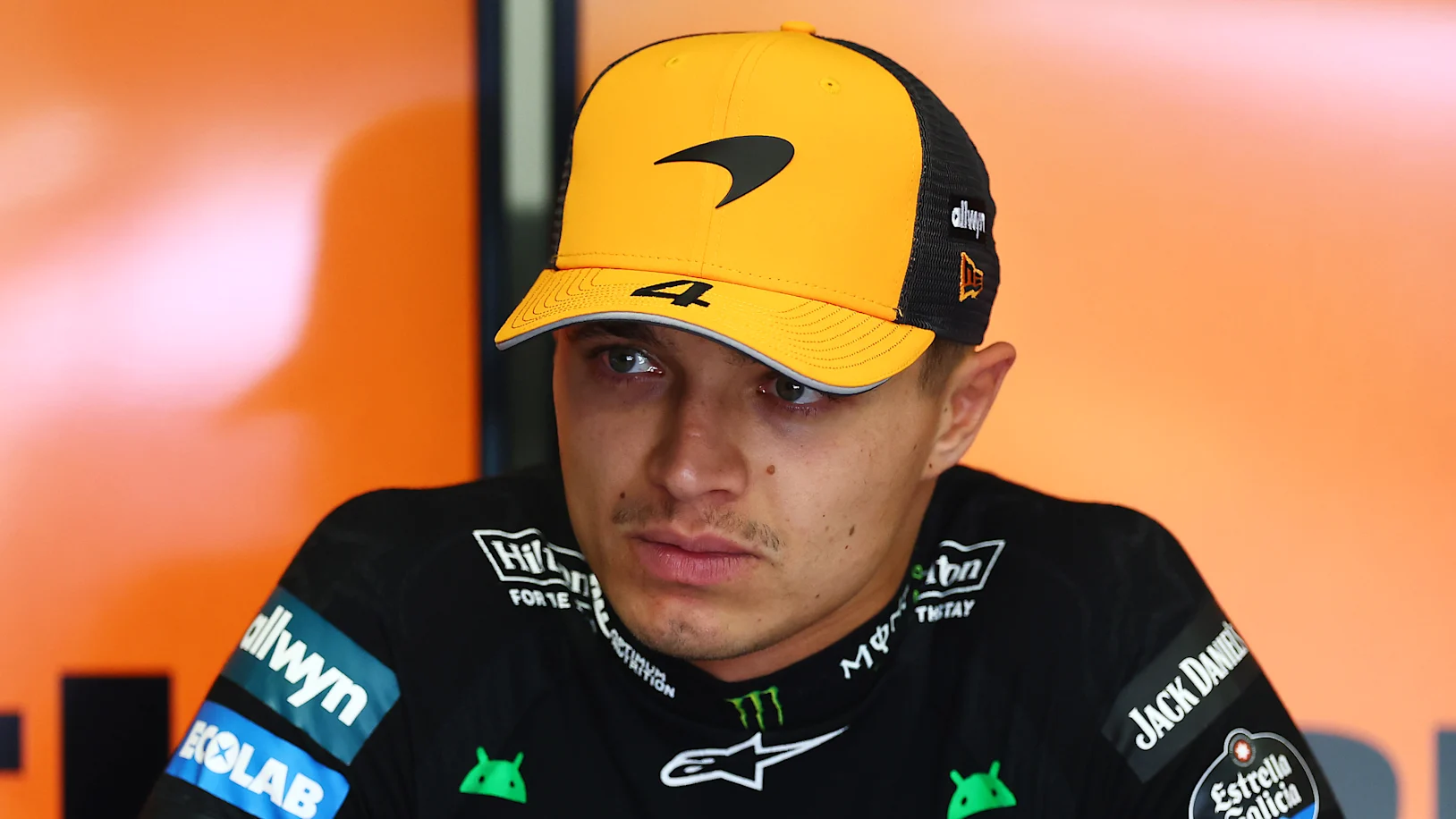 BARCELONA, SPAIN - MAY 31: Lando Norris of Great Britain and McLaren looks on in the garage during