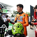 SAO PAULO, BRAZIL - NOVEMBER 08: Pole position qualifier Lando Norris of Great Britain and McLaren Second placed qualifier Andrea Kimi Antonelli of Italy and Mercedes AMG Petronas F1 Team and Third placed qualifier Charles Leclerc of Monaco and Scuderia Ferrari in parc ferme during qualifying ahead of the F1 Grand Prix of Brazil at Autodromo Jose Carlos Pace on November 08, 2025 in Sao Paulo, Brazil. (Photo by Mark Sutton - Formula 1/Formula 1 via Getty Images)