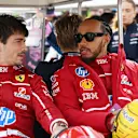 BAHRAIN, BAHRAIN - FEBRUARY 26: Charles Leclerc of Monaco and Scuderia Ferrari and Lewis Hamilton