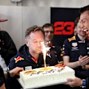2019: Horner is presented with a birthday cake by Verstappen and then Red Bull driver Alex Albon in Brazil