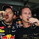 2013: Horner and Vettel celebrate a fourth straight Drivers' title triumph at the Indian Grand Prix. Red Bull also won the Constructors' title each year from 2010-2013