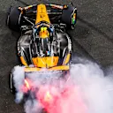 Donuts were the order of the day when Norris crossed the line to seal the title