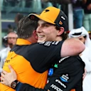 ABU DHABI, UNITED ARAB EMIRATES - DECEMBER 07: Zak Brown, Chief Executive Officer of McLaren congratulates Second placed Oscar Piastri of Australia and McLaren in parc ferme during the F1 Grand Prix of Abu Dhabi at Yas Marina Circuit on December 07, 2025 in Abu Dhabi, United Arab Emirates. (Photo by Mark Thompson/Getty Images)