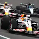 SAO PAULO, BRAZIL - NOVEMBER 09: Isack Hadjar of France driving the (6) Visa Cash App Racing Bulls VCARB 02 leads Liam Lawson of New Zealand driving the (30) Visa Cash App Racing Bulls VCARB 02 and George Russell of Great Britain driving the (63) Mercedes AMG Petronas F1 Team W16 on track during the F1 Grand Prix of Brazil at Autodromo Jose Carlos Pace on November 09, 2025 in Sao Paulo, Brazil. (Photo by Mark Thompson/Getty Images)