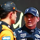 LAS VEGAS, NEVADA - NOVEMBER 21: Pole position qualifier Lando Norris of Great Britain and McLaren and Second placed qualifier Max Verstappen of the Netherlands and Oracle Red Bull Racing talk in parc ferme during qualifying ahead of the F1 Grand Prix of Las Vegas at Las Vegas Strip Circuit on November 21, 2025 in Las Vegas, Nevada. (Photo by Bryn Lennon - Formula 1/Formula 1 via Getty Images)