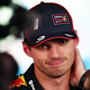 LUSAIL CITY, QATAR - NOVEMBER 29: Fourth placed Max Verstappen of the Netherlands and Oracle Red Bull Racing is interviewed during the Sprint ahead of the F1 Grand Prix of Qatar at Lusail International Circuit on November 29, 2025 in Lusail City, Qatar. (Photo by Peter Fox/Getty Images)