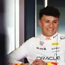 Isack Hadjar smiles as he prepares for action with his new team, Red Bull