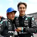 MELBOURNE, AUSTRALIA - MARCH 07: Pole position qualifier George Russell of Great Britain and Mercedes AMG Petronas F1 Team and Second placed qualifier Andrea Kimi Antonelli of Italy and Mercedes AMG Petronas F1 Team congratulate each other in parc ferme during qualifying ahead of the F1 Grand Prix of Australia at Albert Park Grand Prix Circuit on March 07, 2026 in Melbourne, Australia. (Photo by Mark Sutton - Formula 1/Formula 1 via Getty Images)
