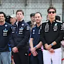 SHANGHAI, CHINA - MARCH 23: Drivers and team personnel gather for a tribute to the late Eddie