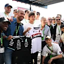 Lorenzo De Silvestri of FC Bologna swaps shirts with Kimi Antonelli