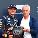 NORTHAMPTON, ENGLAND - JULY 05: Pole position qualifier Max Verstappen of the Netherlands and Oracle Red Bull Racing receives his Pirelli Pole Position Award from Jose Mourinho during qualifying ahead of the F1 Grand Prix of Great Britain at Silverstone Circuit on July 05, 2025 in Northampton, England. (Photo by Bryn Lennon - Formula 1/Formula 1 via Getty Images)