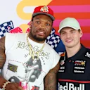Max Verstappen poses with NFL star Derrick Henry Jr