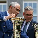 Admiring the Drivers' and Teams' Championship trophies