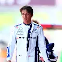 SPIELBERG, AUSTRIA - JUNE 28: 19th placed qualifier Alexander Albon of Thailand and Williams walks in the Pitlane during Sprint Qualifying ahead of the F1 Grand Prix of Austria at Red Bull Ring on June 28, 2024 in Spielberg, Austria. (Photo by Bryn Lennon - Formula 1/Formula 1 via Getty Images)