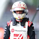 NORTHAMPTON, ENGLAND - JULY 06: 17th placed qualifier Kevin Magnussen of Denmark and Haas F1 walks in the Pitlane during qualifying ahead of the F1 Grand Prix of Great Britain at Silverstone Circuit on July 06, 2024 in Northampton, England. (Photo by Bryn Lennon - Formula 1/Formula 1 via Getty Images)