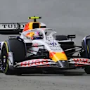 SINGAPORE, SINGAPORE - OCTOBER 05: Liam Lawson of New Zealand driving the (30) Visa Cash App Racing Bulls VCARB 02 on track during the F1 Grand Prix of Singapore at Marina Bay Street Circuit on October 05, 2025 in Singapore, Singapore. (Photo by Clive Rose - Formula 1/Formula 1 via Getty Images)