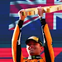 SPIELBERG, AUSTRIA - JUNE 29: Race winner Lando Norris of Great Britain and McLaren lifts his trophy on the podium during the F1 Grand Prix of Austria at Red Bull Ring on June 29, 2025 in Spielberg, Austria. (Photo by Joe Portlock/Getty Images)