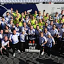 SPIELBERG, AUSTRIA - JUNE 29: Twelfth placed Isack Hadjar of France and Visa Cash App Racing Bulls Sixth placed Liam Lawson of New Zealand and Visa Cash App Racing Bulls Peter Bayer, CEO of Visa Cash App Racing Bulls Laurent Mekies, Team Principal of Visa Cash App Racing Bulls and the Visa Cash App Racing Bulls team celebrate during the F1 Grand Prix of Austria at Red Bull Ring on June 29, 2025 in Spielberg, Austria. (Photo by Rudy Carezzevoli/Getty Images)