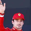 SPIELBERG, AUSTRIA - JUNE 28: Second placed qualifier Charles Leclerc of Monaco and Scuderia Ferrari waves from parc ferme during qualifying ahead of the F1 Grand Prix of Austria at Red Bull Ring on June 28, 2025 in Spielberg, Austria. (Photo by Joe Portlock/Getty Images)