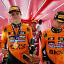 SPA, BELGIUM - JULY 27: Race winner Oscar Piastri of Australia and McLaren Second placed Lando Norris of Great Britain and McLaren and Third placed Charles Leclerc of Monaco and Scuderia Ferrari leave the podium during the F1 Grand Prix of Belgium at Circuit de Spa-Francorchamps on July 27, 2025 in Spa, Belgium. (Photo by Mark Sutton - Formula 1/Formula 1 via Getty Images)