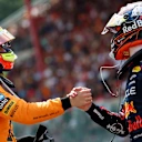 SPA, BELGIUM - JULY 26: Sprint winner Max Verstappen of the Netherlands and Oracle Red Bull Racing and Second placed Oscar Piastri of Australia and McLaren congratulate each other in parc ferme during the Sprint ahead of the F1 Grand Prix of Belgium at Circuit de Spa-Francorchamps on July 26, 2025 in Spa, Belgium. (Photo by Mark Thompson/Getty Images)
