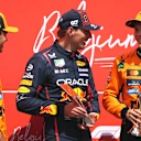 SPA, BELGIUM - JULY 26: Sprint winner Max Verstappen of the Netherlands and Oracle Red Bull Racing Second placed Oscar Piastri of Australia and McLaren and Third placed Lando Norris of Great Britain and McLaren with their trophies during the Sprint ahead of the F1 Grand Prix of Belgium at Circuit de Spa-Francorchamps on July 26, 2025 in Spa, Belgium. (Photo by Alex Bierens de Haan/Getty Images)