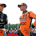 SPA, BELGIUM - JULY 26: Pole position qualifier Lando Norris of Great Britain and McLaren and Second placed qualifier Oscar Piastri of Australia and McLaren talk in parc ferme during qualifying ahead of the F1 Grand Prix of Belgium at Circuit de Spa-Francorchamps on July 26, 2025 in Spa, Belgium. (Photo by Mark Sutton - Formula 1/Formula 1 via Getty Images)