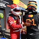 SPA, BELGIUM - JULY 26: Third placed qualifier Charles Leclerc of Monaco and Scuderia Ferrari and Second placed qualifier Oscar Piastri of Australia and McLaren in parc ferme during qualifying ahead of the F1 Grand Prix of Belgium at Circuit de Spa-Francorchamps on July 26, 2025 in Spa, Belgium. (Photo by Mark Sutton - Formula 1/Formula 1 via Getty Images)