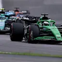 SAO PAULO, BRAZIL - NOVEMBER 09: Nico Hulkenberg of Germany driving the (27) Kick Sauber C45 Ferrari leads Fernando Alonso of Spain driving the (14) Aston Martin F1 Team AMR25 Mercedes on track during the F1 Grand Prix of Brazil at Autodromo Jose Carlos Pace on November 09, 2025 in Sao Paulo, Brazil. (Photo by Lars Baron/Getty Images)