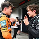 SAO PAULO, BRAZIL - NOVEMBER 08: Pole position qualifier Lando Norris of Great Britain and McLaren and Second placed qualifier Andrea Kimi Antonelli of Italy and Mercedes AMG Petronas F1 Team talk in parc ferme during qualifying ahead of the F1 Grand Prix of Brazil at Autodromo Jose Carlos Pace on November 08, 2025 in Sao Paulo, Brazil. (Photo by Mark Sutton - Formula 1/Formula 1 via Getty Images)