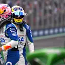 SAO PAULO, BRAZIL - NOVEMBER 08: Seventh placed qualifier Liam Lawson of New Zealand and Visa Cash App Racing Bulls and Fifth placed qualifier Isack Hadjar of France and Visa Cash App Racing Bulls congratulate each other in parc ferme during qualifying ahead of the F1 Grand Prix of Brazil at Autodromo Jose Carlos Pace on November 08, 2025 in Sao Paulo, Brazil. (Photo by Rudy Carezzevoli/Getty Images)