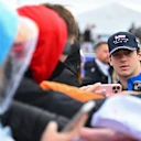 NORTHAMPTON, ENGLAND - JULY 06: Franco Colapinto of Argentina and Alpine F1 poses for a selfie with a fan prior to the F1 Grand Prix of Great Britain at Silverstone Circuit on July 06, 2025 in Northampton, England. (Photo by Mark Sutton - Formula 1/Formula 1 via Getty Images)