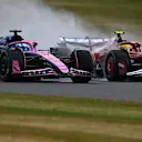 NORTHAMPTON, ENGLAND - JULY 06: Pierre Gasly of France driving the (10) Alpine F1 A525 Renault and Lewis Hamilton of Great Britain driving the (44) Scuderia Ferrari SF-25 battle for track position on track during the F1 Grand Prix of Great Britain at Silverstone Circuit on July 06, 2025 in Northampton, England. (Photo by Rudy Carezzevoli/Getty Images)