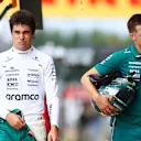 NORTHAMPTON, ENGLAND - JULY 05: Eighteenth placed qualifier Lance Stroll of Canada and Aston Martin F1 Team walks in the Pitlane during qualifying ahead of the F1 Grand Prix of Great Britain at Silverstone Circuit on July 05, 2025 in Northampton, England. (Photo by Bryn Lennon - Formula 1/Formula 1 via Getty Images)