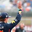 NORTHAMPTON, ENGLAND - JULY 05: Pole position qualifier Max Verstappen of the Netherlands and Oracle Red Bull Racing waves from parc ferme during qualifying ahead of the F1 Grand Prix of Great Britain at Silverstone Circuit on July 05, 2025 in Northampton, England. (Photo by Mark Thompson/Getty Images)