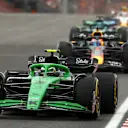 BUDAPEST, HUNGARY - AUGUST 03: Gabriel Bortoleto of Brazil driving the (5) Kick Sauber C45 Ferrari leads Max Verstappen of the Netherlands driving the (1) Oracle Red Bull Racing RB21 on track during the F1 Grand Prix of Hungary at Hungaroring on August 03, 2025 in Budapest, Hungary. (Photo by Clive Rose/Getty Images)