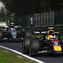 MONZA, ITALY - SEPTEMBER 07: Yuki Tsunoda of Japan driving the (22) Oracle Red Bull Racing RB21 leads Andrea Kimi Antonelli of Italy driving the (12) Mercedes AMG Petronas F1 Team W16 and Oliver Bearman of Great Britain driving the (87) Haas F1 VF-25 Ferrari on track during the F1 Grand Prix of Italy at Autodromo Nazionale Monza on September 07, 2025 in Monza, Italy. (Photo by Rudy Carezzevoli/Getty Images)