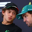 MONZA, ITALY - SEPTEMBER 04: Andrea Kimi Antonelli of Italy and Mercedes AMG Petronas F1 Team talks with Fernando Alonso of Spain and Aston Martin F1 Team in the Drivers Press Conference during previews ahead of the F1 Grand Prix of Italy at Autodromo Nazionale Monza on September 04, 2025 in Monza, Italy. (Photo by Clive Rose/Getty Images)