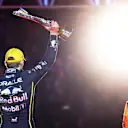 LAS VEGAS, NEVADA - NOVEMBER 22: Race winner Max Verstappen of the Netherlands and Oracle Red Bull Racing lifts his trophy on the podium during the F1 Grand Prix of Las Vegas at Las Vegas Strip Circuit on November 22, 2025 in Las Vegas, Nevada. (Photo by Mark Thompson/Getty Images)