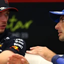LUSAIL CITY, QATAR - NOVEMBER 30: Race winner Max Verstappen of the Netherlands and Oracle Red Bull Racing and Third placed Carlos Sainz of Spain and Williams talk in the Drivers Press Conference during the F1 Grand Prix of Qatar at Lusail International Circuit on November 30, 2025 in Lusail City, Qatar. (Photo by Clive Rose/Getty Images)