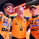 LUSAIL CITY, QATAR - NOVEMBER 29: Zak Brown, Chief Executive Officer of McLaren celebrates with Sprint winner Oscar Piastri of Australia and McLaren and Third placed Lando Norris of Great Britain and McLaren in parc ferme during the Sprint ahead of the F1 Grand Prix of Qatar at Lusail International Circuit on November 29, 2025 in Lusail City, Qatar. (Photo by Mark Sutton - Formula 1/Formula 1 via Getty Images)