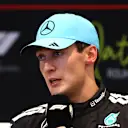 LUSAIL CITY, QATAR - NOVEMBER 29: Second placed George Russell of Great Britain and Mercedes AMG Petronas F1 Team in the Drivers Press Conference during the Sprint ahead of the F1 Grand Prix of Qatar at Lusail International Circuit on November 29, 2025 in Lusail City, Qatar. (Photo by Clive Rose/Getty Images)