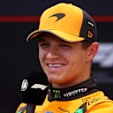 LUSAIL CITY, QATAR - NOVEMBER 29: Third placed Lando Norris of Great Britain and McLaren in the Drivers Press Conference during the Sprint ahead of the F1 Grand Prix of Qatar at Lusail International Circuit on November 29, 2025 in Lusail City, Qatar. (Photo by Clive Rose/Getty Images)