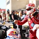 AUSTIN, TEXAS - OCTOBER 19: Race winner Max Verstappen of the Netherlands and Oracle Red Bull Racing Second placed Lando Norris of Great Britain and McLaren and Third placed Charles Leclerc of Monaco and Scuderia Ferrari talk in parc ferme during the F1 Grand Prix of United States at Circuit of The Americas on October 19, 2025 in Austin, Texas. (Photo by Jared C. Tilton/Getty Images)