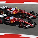 AUSTIN, TEXAS - OCTOBER 19: Charles Leclerc of Monaco driving the (16) Scuderia Ferrari SF-25 and Lewis Hamilton of Great Britain driving the (44) Scuderia Ferrari SF-25 battle for track position during the F1 Grand Prix of United States at Circuit of The Americas on October 19, 2025 in Austin, Texas. (Photo by Clive Mason/Getty Images)